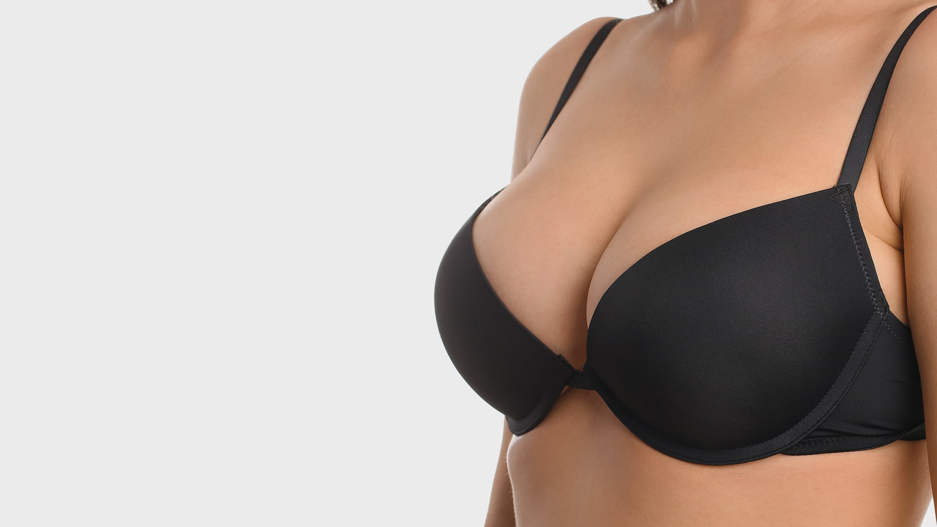 breast lift in jackson model with black bra