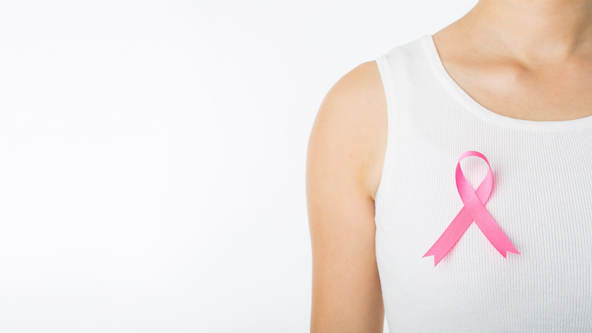 breast reconstruction in jackson model with white shirt pink ribbon